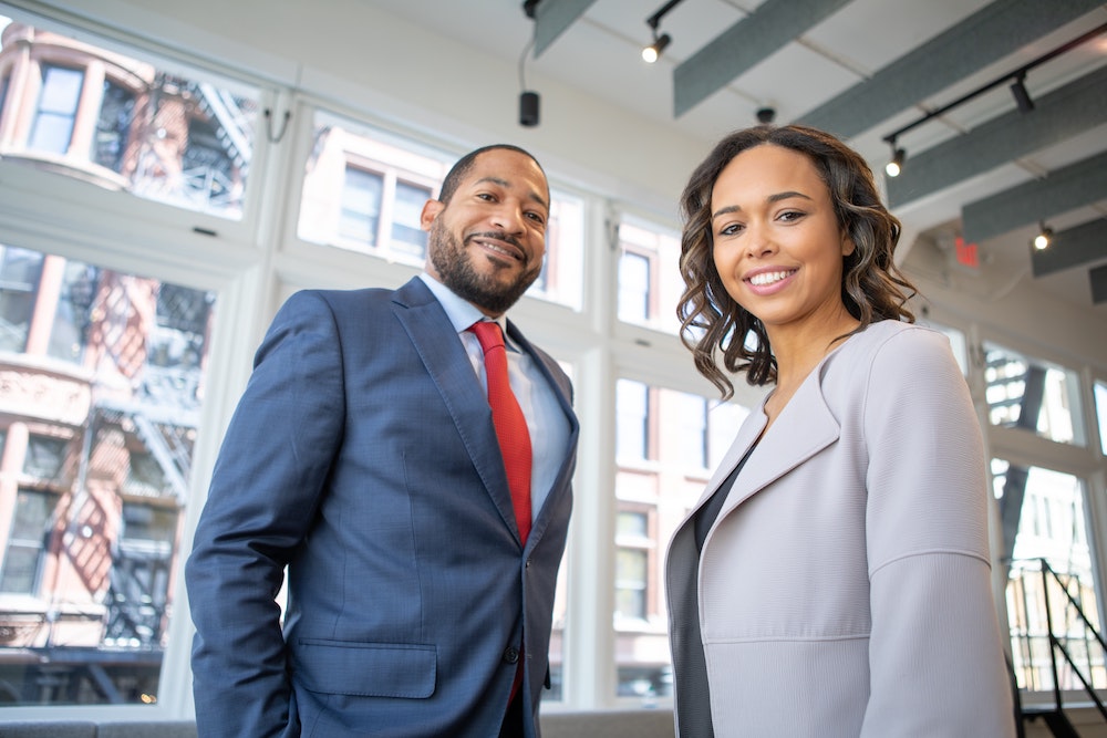 Man and Woman in Business Attire